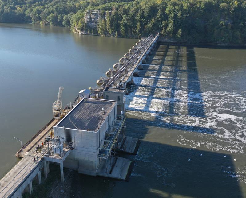 Fire crews work the scene of a fire at the Starved Rock hydroelectric power plant at the Starved Rock Lock and Dam on Tuesday, Oct. 3, 2023 near Utica. A MABAS box alarm was sent out just before 730a.m. for a working fire inside the plant.
