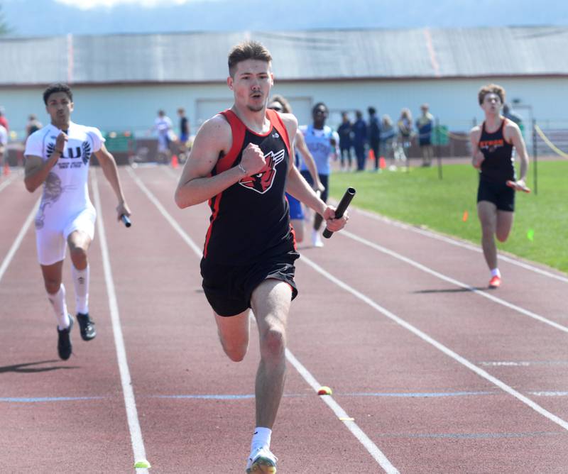 Forreston-Polo's Noah Dewey crosses the finish line first in the 800 relay at the Gebhardt-Worley Invitational at Oregon High School on Saturday, April 12, 2025. Forreston won the race in 1:32.1.