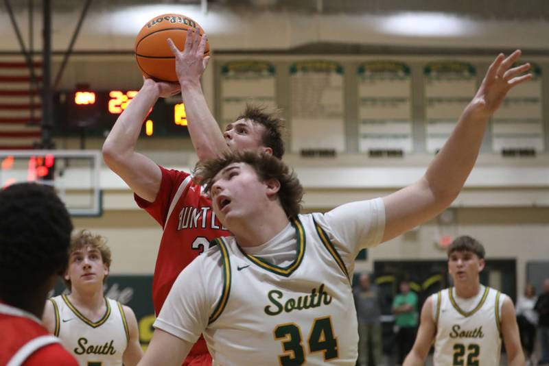 Huntley's Aidan Gibbs shoots the ball over Crystal Lake South's Johnathan Morgan n during a Fox Valley Conference boys basketball game on Friday, Jan. 30, 2026, at Crystal Lake South High School.