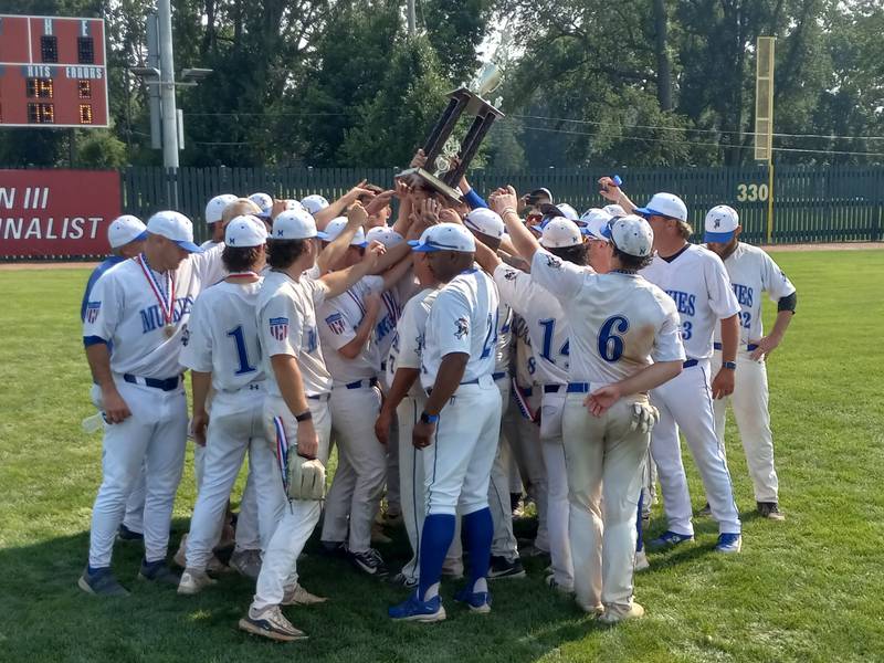 The Beecher Muskies celebrate with their trophy after winning the NABF World Series at North Central College on Aug. 3, 2025.