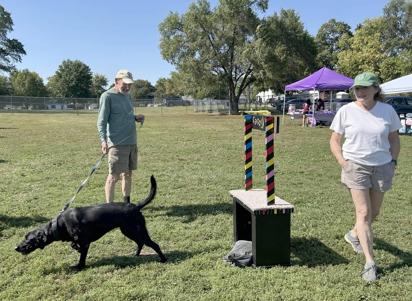 Mark and Deb Herman of Oregon, and their dog Najee check out the Bonafied Rescue Rally in Oregon on Saturday, Sept. 27, 2025.