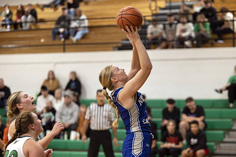 Newman’s Jess Johns puts a shot up against Rock Falls Thursday, Nov. 16, 2023.