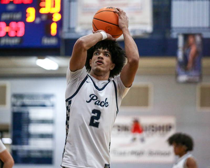 Oswego East's Jacsen Tucker (2) shoots a free throw during their basketball game between Oswego at Oswego East, Feb 13, 2026 in Oswego.