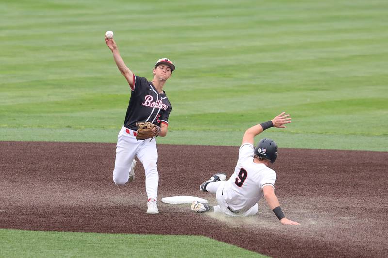 Bradley-Bourbonnais’ Jace Boudreau attempts a double play during the Boilermakers’ 2-0 loss to Normal Community in the IHSA Class 4A Illinois Wesleyan University Sectional semifinal on Thursday, June 5, 2025.