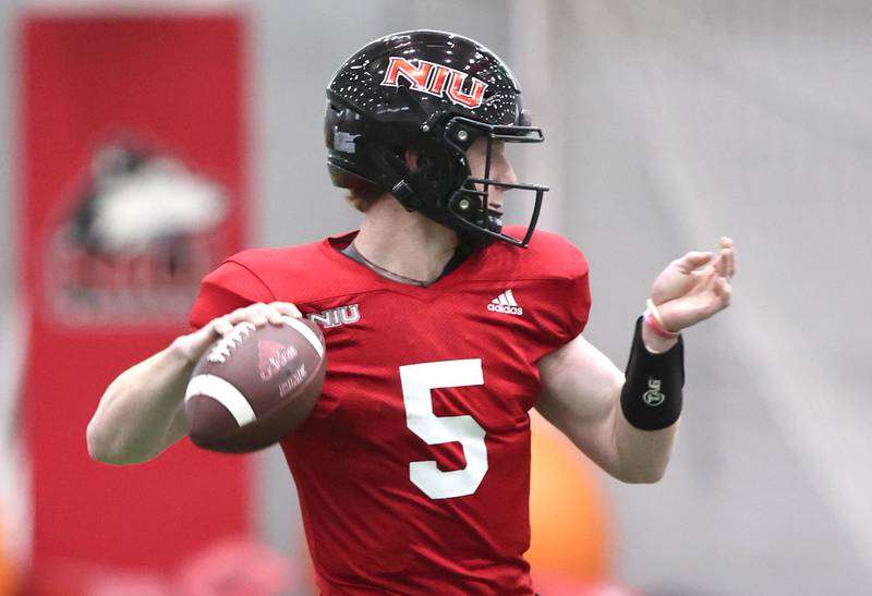 Northern Illinois University quarterback Justin Lynch throws a pass during spring practice Wednesday, April 6, 2022, in the Chessick Practice Center at NIU in DeKalb.