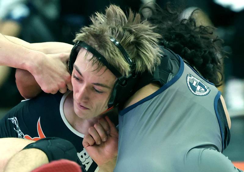 DeKalb’s Tyler Daub (left) tries to escape from Lake Park’s Sergio Hernandez Wednesday, Nov. 27, 2024, during their 126 pound match at DeKalb High School. Daub fell to Hernandez by a major decision.