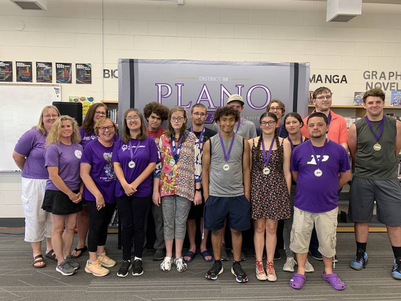 The Plano School District Unified Track and Field Team received recognition for winning state finals in May at the June Board of Education meeting. Coaches Leann Teckenbrock, Pam Schweitzer, Renee DeCamp and Beth Lohrey accompanied the athletes.