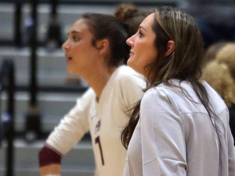 Prairie Ridge’s Head Coach Hilary Agnello and her daughter Maizy prepare to face Woodstock North in IHSA Class 3A Sectional semifinal volleyball action on Tuesday, Nov. 5, 2024, at  Crystal Lake South High School  in Crystal Lake.