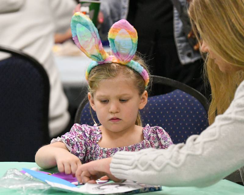 Olivia Reese, 5, of La Grange does some crafts before having breakfast and meeting the Easter bunny on Saturday March 29, 2025, during the breakfast with the bunny event held at the La Grange Park District Recreation Center.