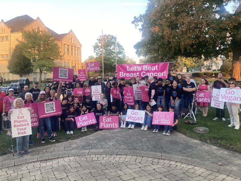 Drummers pose with volunteers and city officials at the Let's Beat Breast Cancer rally in Central Square.
Thursday, Oct. 16, 2025.