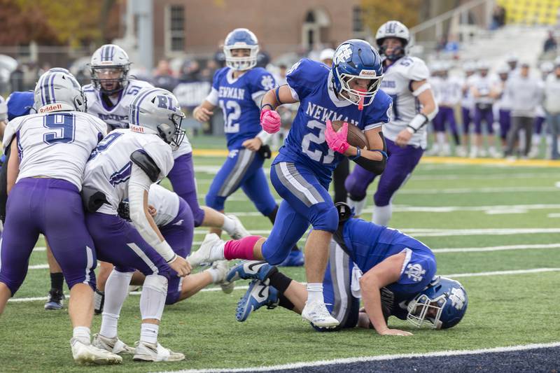 Newman’s Rylan Alvarado leaps into the end zone for a 2-point conversion against Ridgeview-Lexington Saturday, Nov. 1, 2025, in round one of the Class 2A football playoffs.