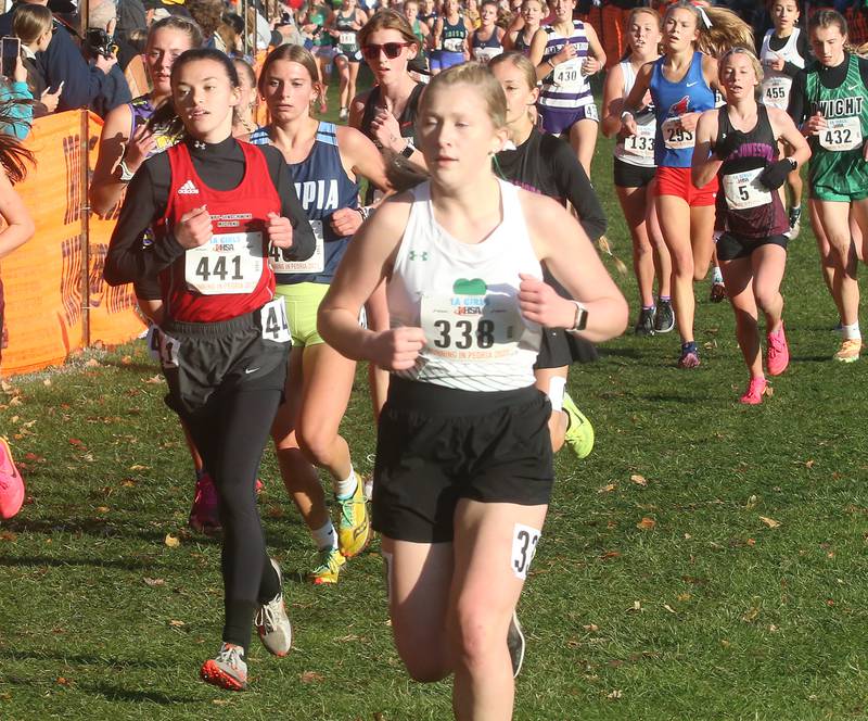 Henry-Senachwine's Daniella Bumber and Seneca's Natalie Misener compete in the Class 1A Cross Country Finals on Saturday, Nov. 4, 2023 at Detweiller Park in Peoria.