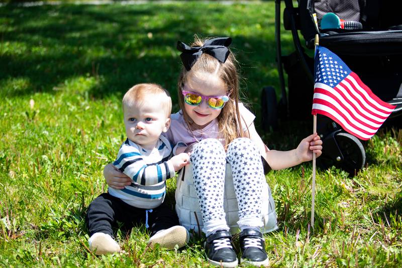 Plainfield residents Troy and Mia Thorgesen enjoy watching the New Lenox Loyalty Day Parade on May 5, 2024. (Laurie Fanelli for Shaw Local News Network)