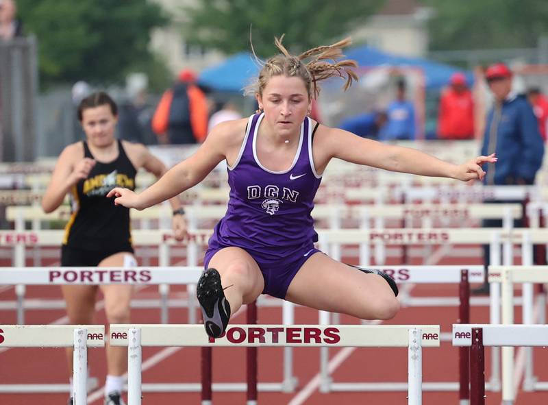 Downers Grove North's Emily Smetana runs the 100m hurdles during the girls varsity track and field 3A Lockport sectional on Friday, May 12, 2023.