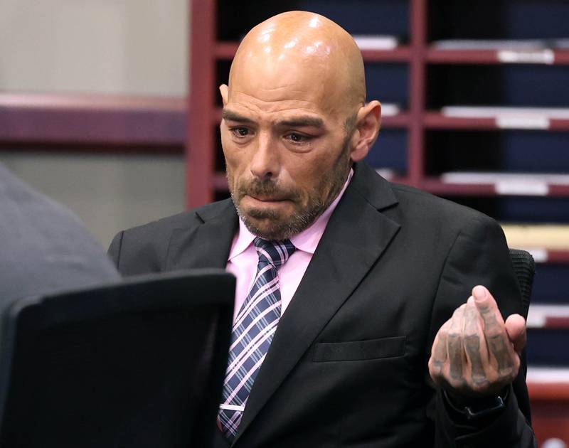 Nathan P. Sweeney, 45, of DeKalb, openly weeps as he apologizes to Christina Musil’s loved ones Tuesday, Aug. 26, 2025, during his sentencing hearing at the DeKalb County Courthouse in Sycamore. Sweeney received 14 years in prison for driving under the influence and causing the 2024 crash that killed Musil, a mother, sheriff's deputy and military veteran.