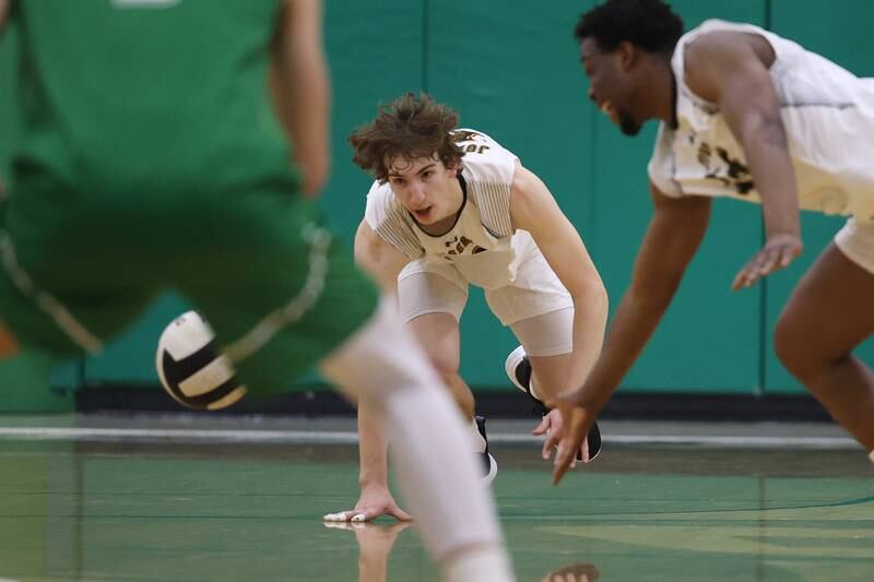 Joliet West’s Thomas Fellows dives for the ball against Providence on Tuesday, April 16, 2024 in New Lenox.