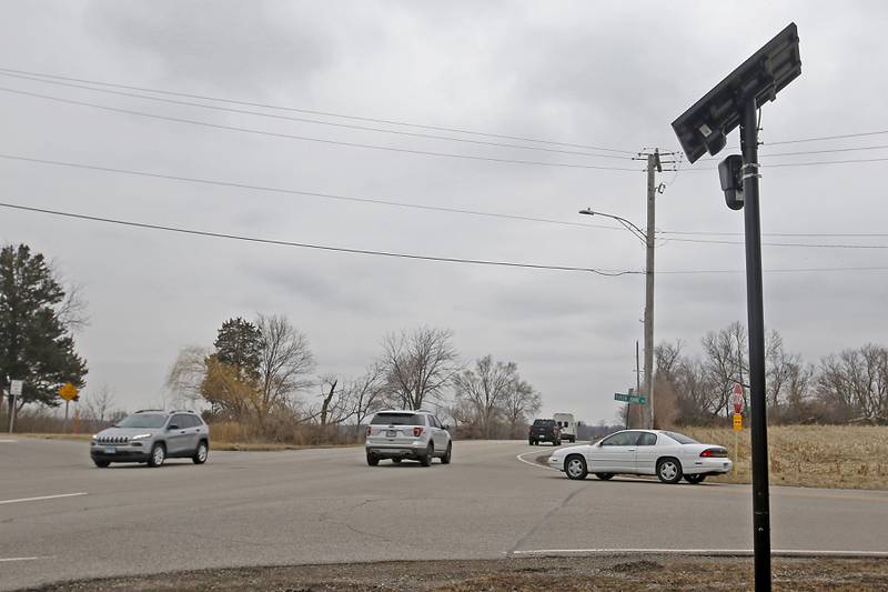 A Flock Safety license plate reader near at the intersection of Route 120 and Queen Anne Road in Woodstock.