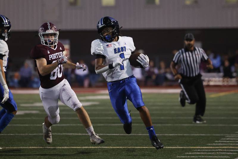 Lincoln-Way East’s Stephon Gardner-Gist takes a punt return deep into Lockport territory on Friday, Sept. 29, 2023 in Lockport.