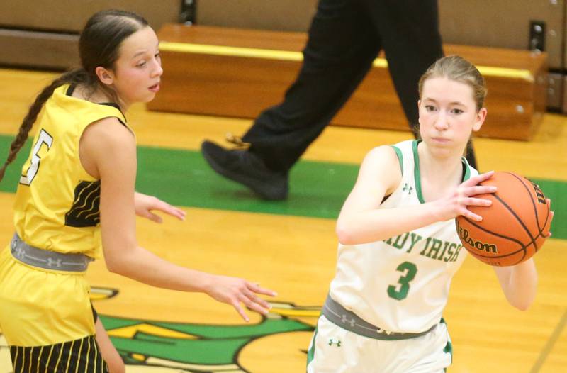 Seneca's Evelyn O'Connor looks to pass around Putnam County's Eme Bouxsein on Thursday, Jan. 4, 2024 at Seneca High School.