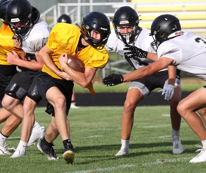 Lena-Winslow and Sycamore scrimmage Thursday, July 24, 2025, during a joint practice with Byron, Lena-Winslow and Sycamore at Sycamore High School.