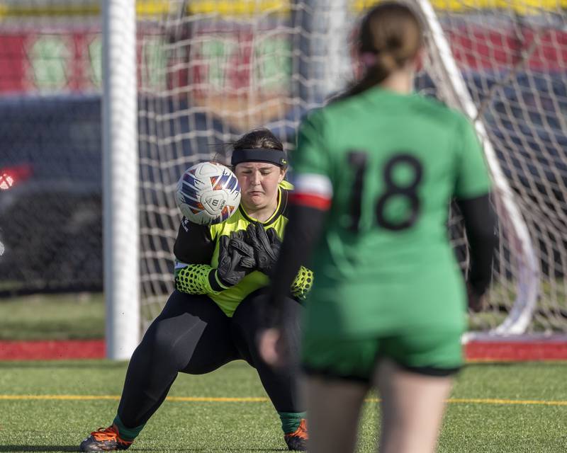 LaSalle-Peru goalkeeper Lilly Higgins blocks an Ottawa athlete's shot during the first half of the match on April 10, 2025 at the LaSalle-Peru Sports Complex.
