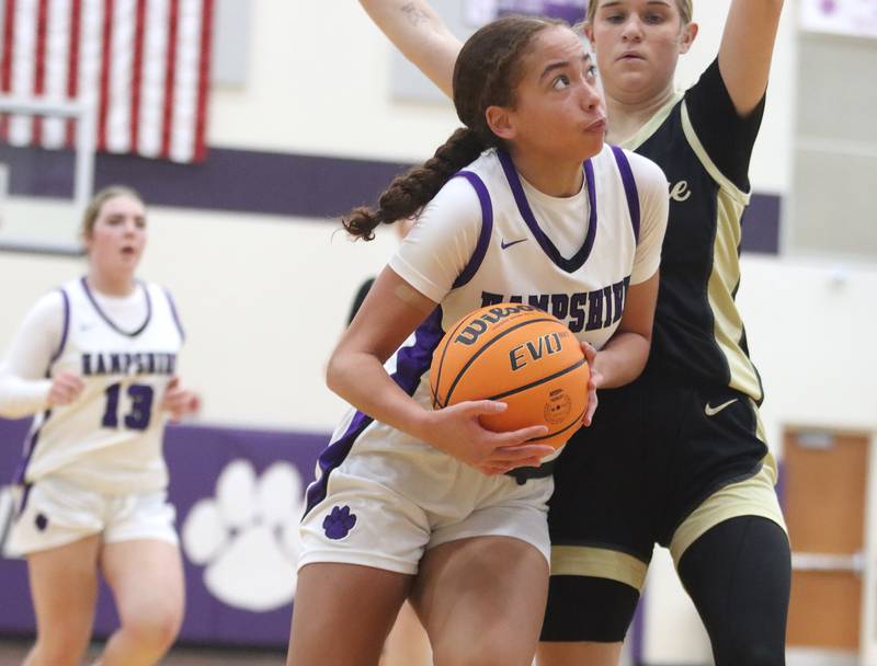 Hampshire’s Mikala Amegasse looks to the hoop against Sycamore in varsity girls basketball on Friday, Jan. 3, 2025, at Hampshire High School in Hampshire.