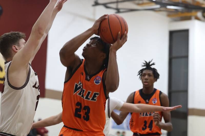 Romeoville’s DJ Porter Jr. looks to take a shot against Lockport in the 2023 WJOL Thanksgiving Tournament on Monday, Nov. 20, 2023, in Joliet.