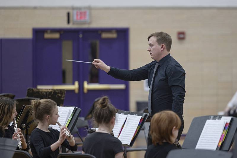 Fifth and sixth grade band leader Chris Hansen leads his musicians in a selection Friday, Feb. 13, 2026.