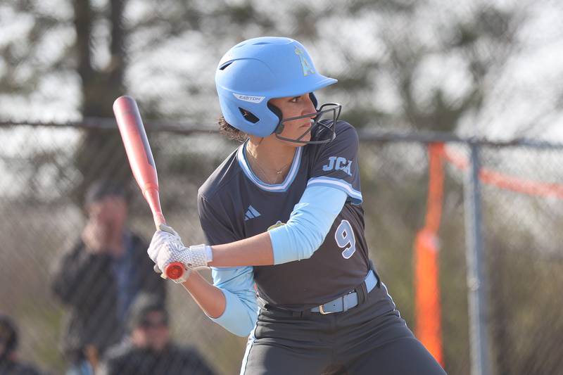 Joliet Catholic’s Kelli O’Hara locks in on a pitch against Minooka on Tuesday, April 7, 2026 in Minooka.