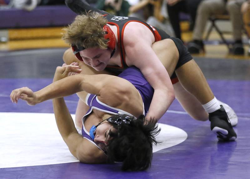Huntley's Dylan Cerny tries to control Hampshire's Uriah Beamon during the 190-pound match of a Fox Valley Conference wrestling meet on Wednesday, Jan. 8, 2025, at Hampshire High School.