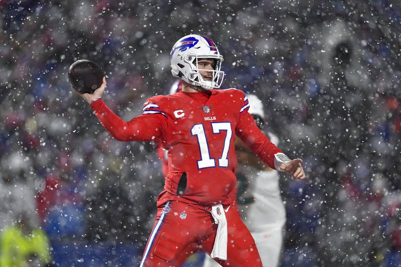 Buffalo Bills quarterback Josh Allen throws a pass during the second half against the Miami Dolphins in Orchard Park, N.Y., Saturday, Dec. 17, 2022.