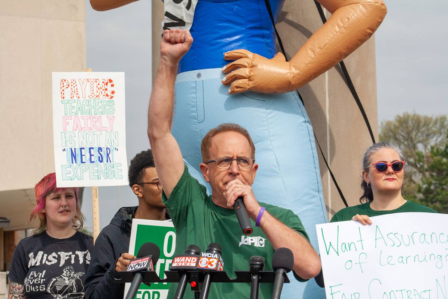 University Professionals of Illinois President John Miller speaks at a news conference during the UIS faculty strike. Miller led the crowd in a series of chants, expressing his disappointment in the U of I system for its funding structure.