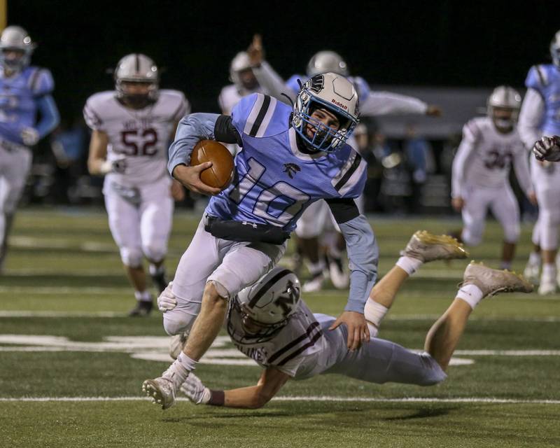 Willowbrook's Joe Tumilty (10) runs after a short reception during Class 7A second-round game between Moline at Willowbrook.