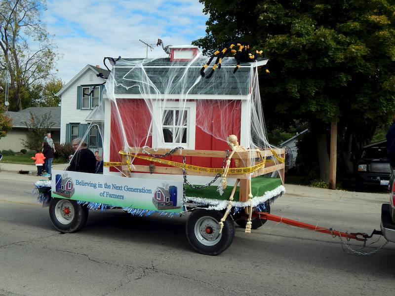 Resource Bank covered a barn-themed playhouse in Halloween spider webs for the Cortland Fall Festival Parade on Oct. 12.