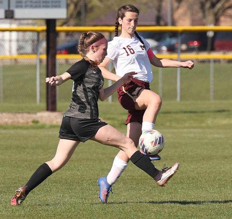 Sycamore's Cortni Kruizenga and Morris' Abby Hanson try to win possession during their Interstate 8 Conference Tournament semifinal game Wednesday, May 3, 2023, at Sycamore High School.