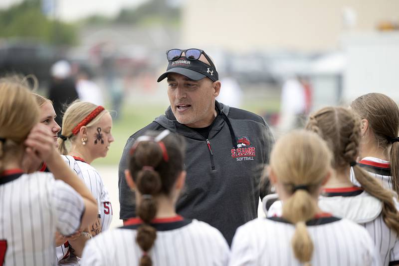 Coach Derek Germann and Fulton celebrate a 9-5 win over Morrison Friday, May 22, 2026, at the Class 1A softball regional at Newman High School.