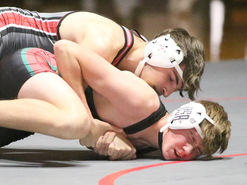 Ottawa's Marek Duffy wrestles L-P's Zach Pocivaesk in the 145 weight match during a wrestling meet in Sellett Gymnasium on Wednesday Dec. 7, 2022 at L-P High School.