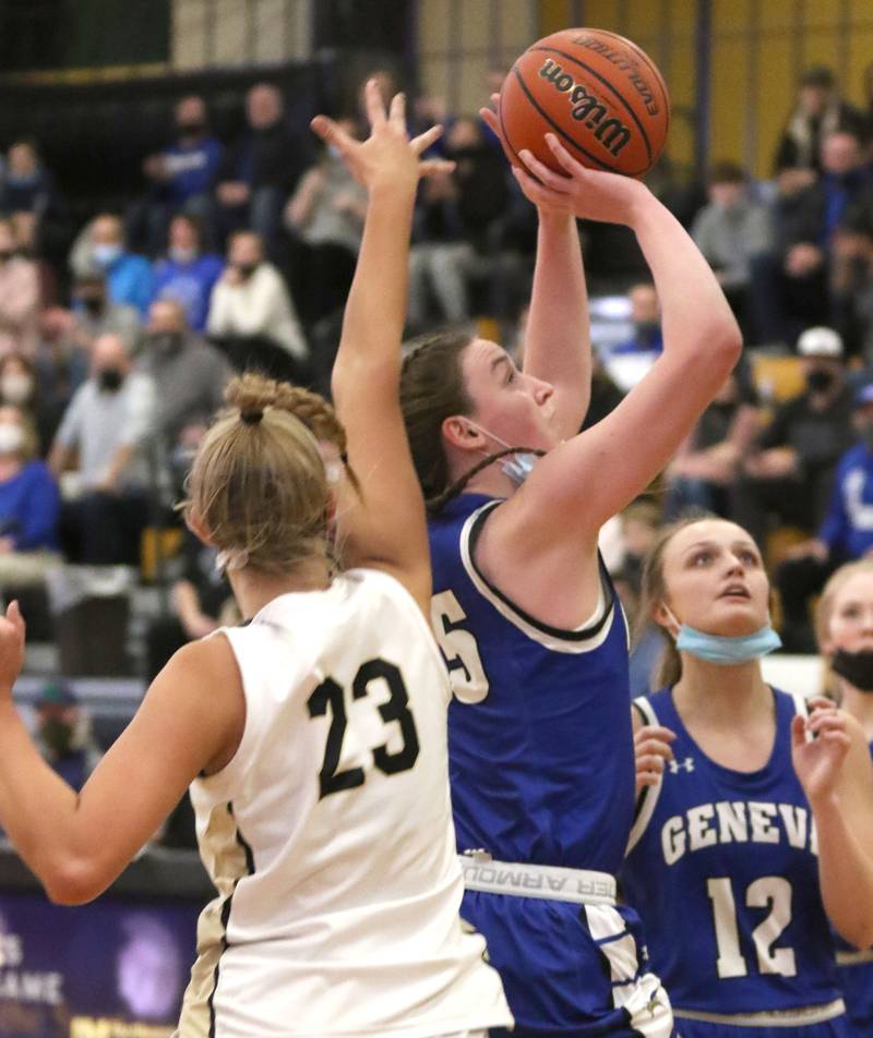 Geneva's Cassidy Arni shoots over Sycamore's Evyn Carrier during their game Thursday, Feb. 10, 2022, at Sycamore High School.