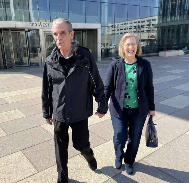 Jill and Robert Steininger leave the Will County Courthouse Wednesday. Steininger was 17 when her sister, Julie Ann Hanson, was killed.