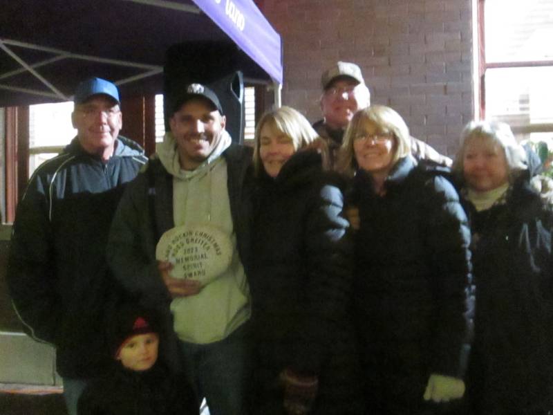 Doug Lyle was presented with this year’s Ross Greiter Memorial Award at the annual Plano Rockin' Christmas events. He is pictured with members of Ross’ family including Steve, Karen Brian, Sharon and Linda.