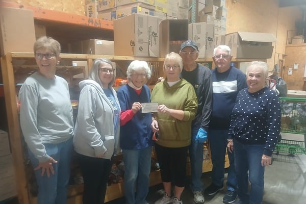 Quartermania donates nearly $1K to Streatorland Food Pantry