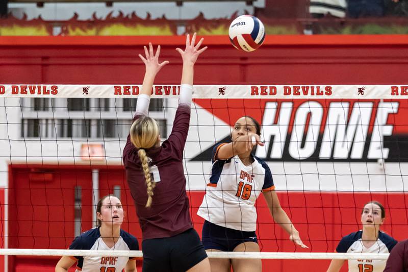 Oak Park-River Forest's Eva Truss spikes during a 4A Supersectional girls volleyball game against Lockport at Hinsdale Central on Nov. 10, 2025.