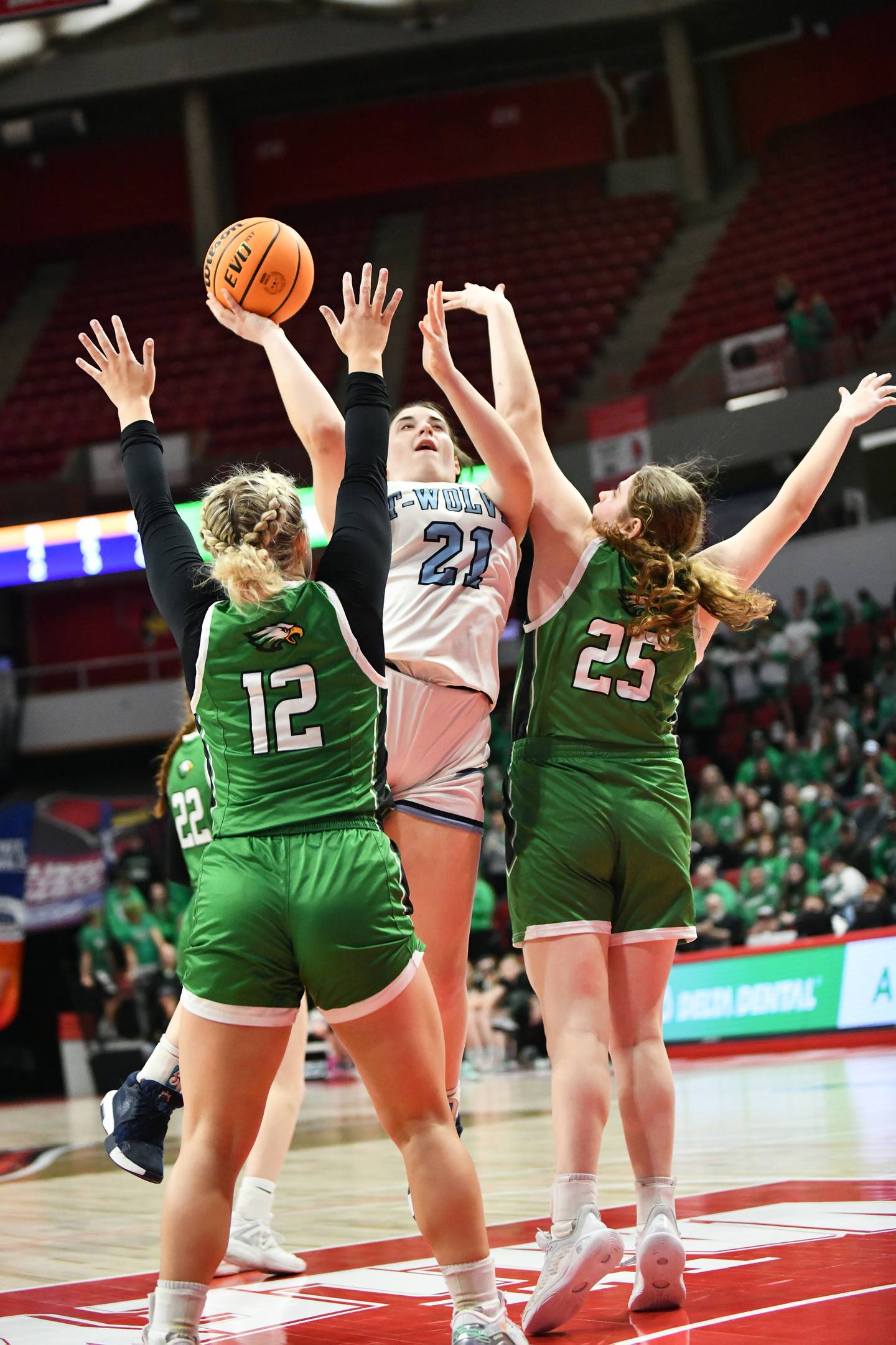 CIssna Park's Lauryn Hamrick shoots under pressure during the Timberwolves' 55-39 loss to Carrollton in the IHSA Class 1A State semifinal on Thursday, March 6, 2025. Cissna Park advances to the third place game on Friday, March 7.