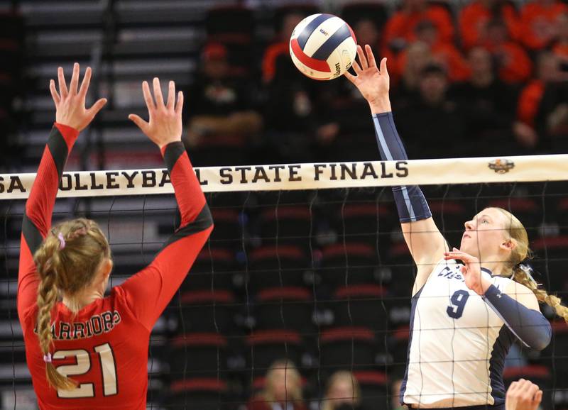 Cissna Park's Sophie Duis spikes the ball ahead of Calhoun's Joy Hurley during the Class 1A State semifinal game on Friday, Nov. 15, 2024 at CEFCU Arena in Normal.