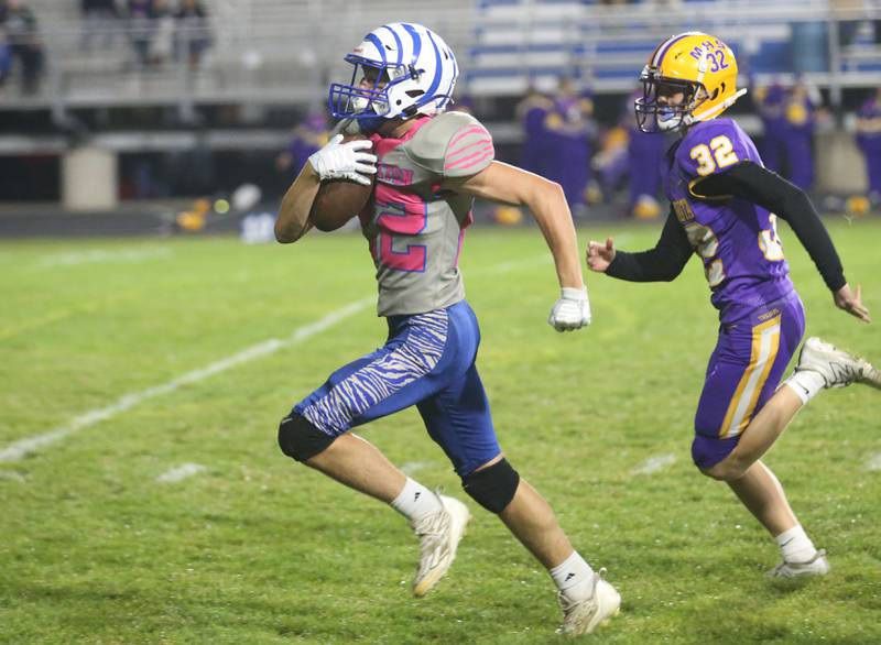 Princeton's Reece Pearson sprints down the field to score a touchdown past Mendota's Dylan Welch on Friday, Oct. 10, 2025 at Bryant Field in Princeton.