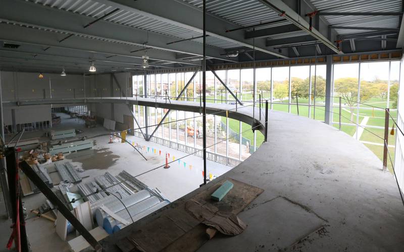 A view of the elevated indoor track inside the new YMCA building on Thursday, Oct., 19, 2023 in Ottawa. The indoor walking/running track above weaves around the wellness area and above the gymnasium.
