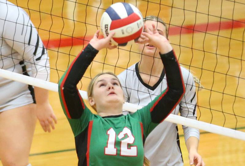 L-P's Emma Jereb sets the ball in the air against Kaneland in AJ Sellett Gymnasium on Thursday, Oct. 24, 2024 at L-P High School.
