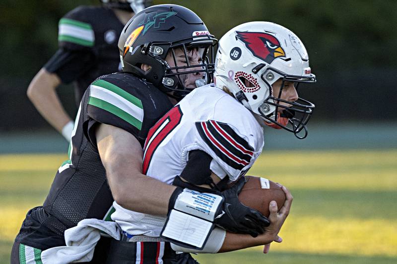 Rock Falls’  Javes Velazquez tackles Stillman Valley’s Keaton Rauman Thursday, August 31, 2023 at Rock Falls High School.