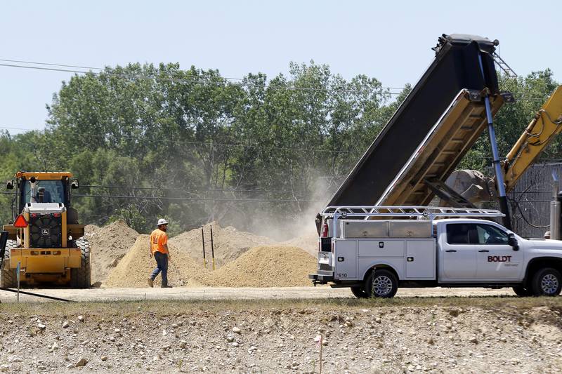 Construction equipment is seen at work during a ground breaking ceremony for a new Mercyhealth hospital at the intersection of Three Oaks Road and Rt. 31 on Wednesday, June 16, 2021 in Crystal Lake.