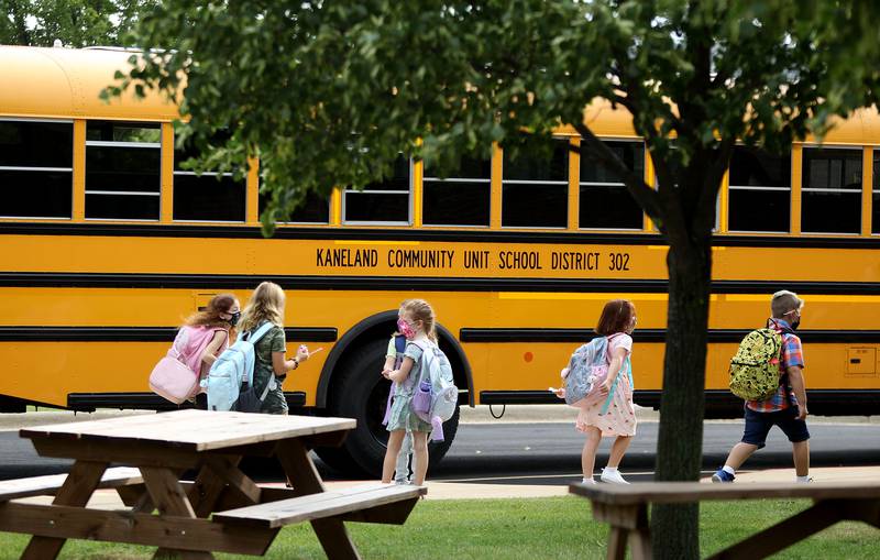 Kaneland McDole Elementary School students arrive for the first day of school Wednesday, Aug. 11, 2021.
